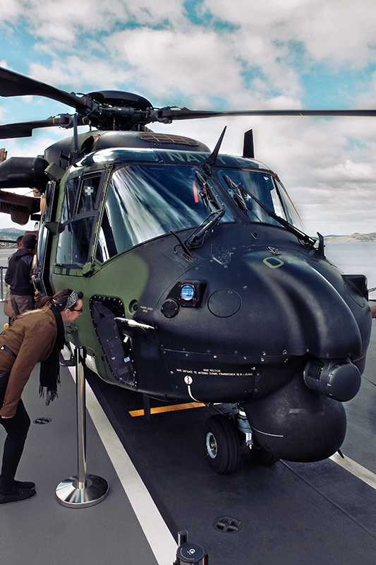 Sinead takes a peak into the cockpit of one of a MRH 90 up on the flight deck. They let you sit inside AND go down the ramp at the back. 5 year old us were very happy with that.