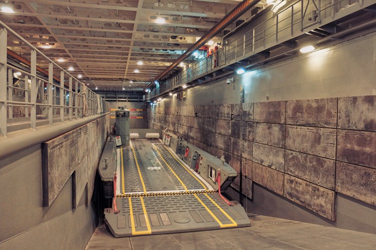 Hellooooooo, ellooooooo, ellooooooooooo. The cavernous lower deck of the ship which is able to carry up to 110 vehicles, including 4 of these kick-ass landing craft.